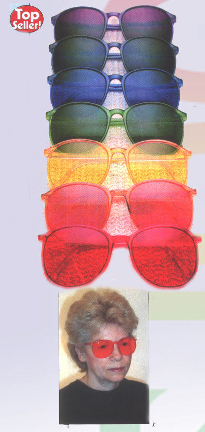 It’s fun, it’s sun protection, it’s mood-enhancing, it’s color therapy, all in 7 dazzling
color glasses!  Yes, each pair of lightweight sunglasses blocks 95% of damaging
UVB, and 60% UVA rays. But color is also a powerful mood regulator which stimulates
and corrects imbalances corresponding to the chakra energy centers of the body.
Colors can even affect the way in which the pineal glands determine endocrine
function. On a psychological level people feel different being immersed in different
colors. Wear th